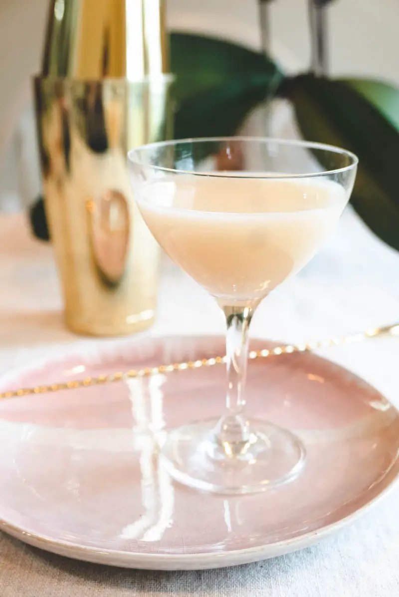 A side shot of the Yakult soju cocktail in a martini glass. 