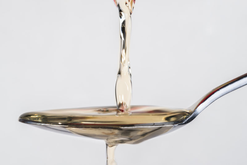 Korean mirim being poured onto a spoon.